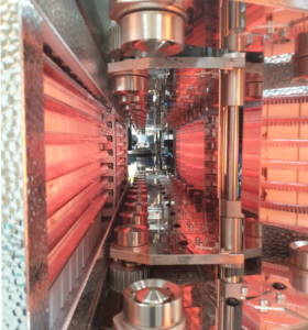 Heating oven section of Ublo Roll to Bottle machine with infrared lamps