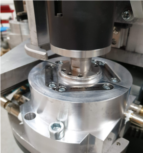 Close-up view of Ublo mold closing mechanism in aluminum